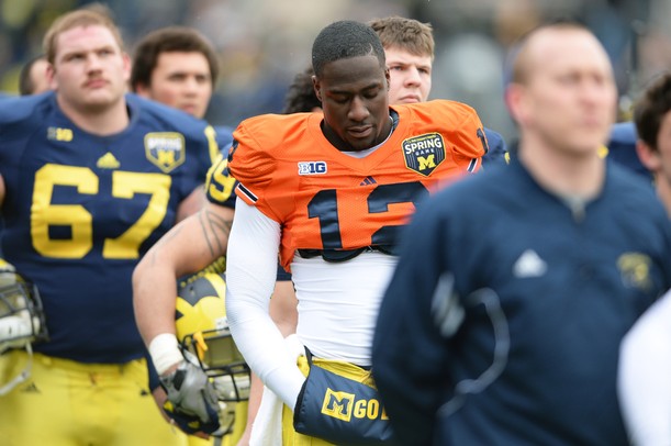 Michigan quarterback Devin Gardner stands during the National Anthem before the spring practice at Michigan Stadium on Saturday, April 13, 2013. Melanie Maxwell I AnnArbor.com